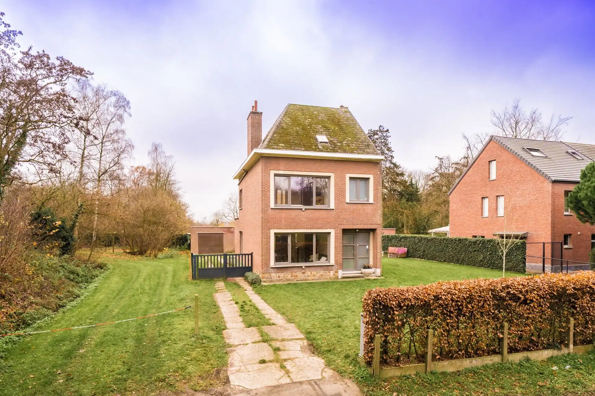 Ruime gezinswoning op perceel van 2.491m² in Mechelen-Zuid foto {{pictureIndex}}