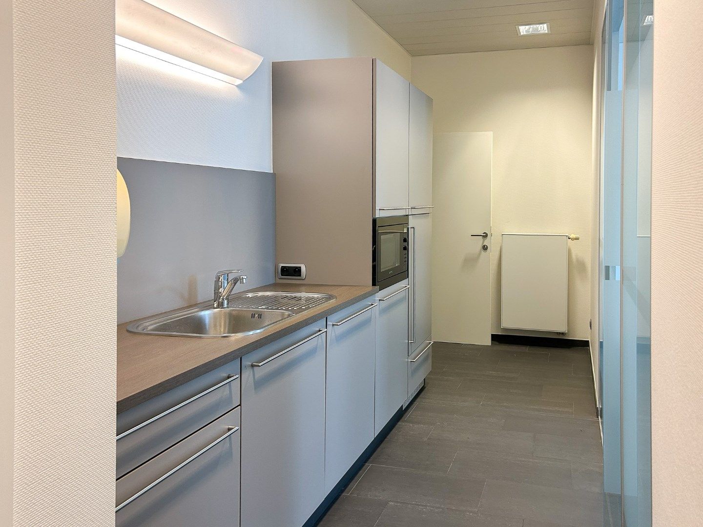 Handelsgelijkvloers met parking op de Leien  foto 13