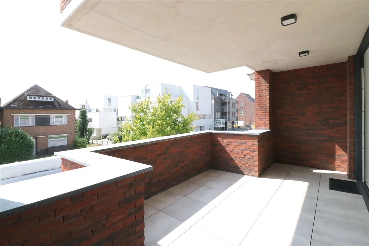 Nieuwbouwapp. met 2 slpk., terras en parking in centrum Averbode foto 9