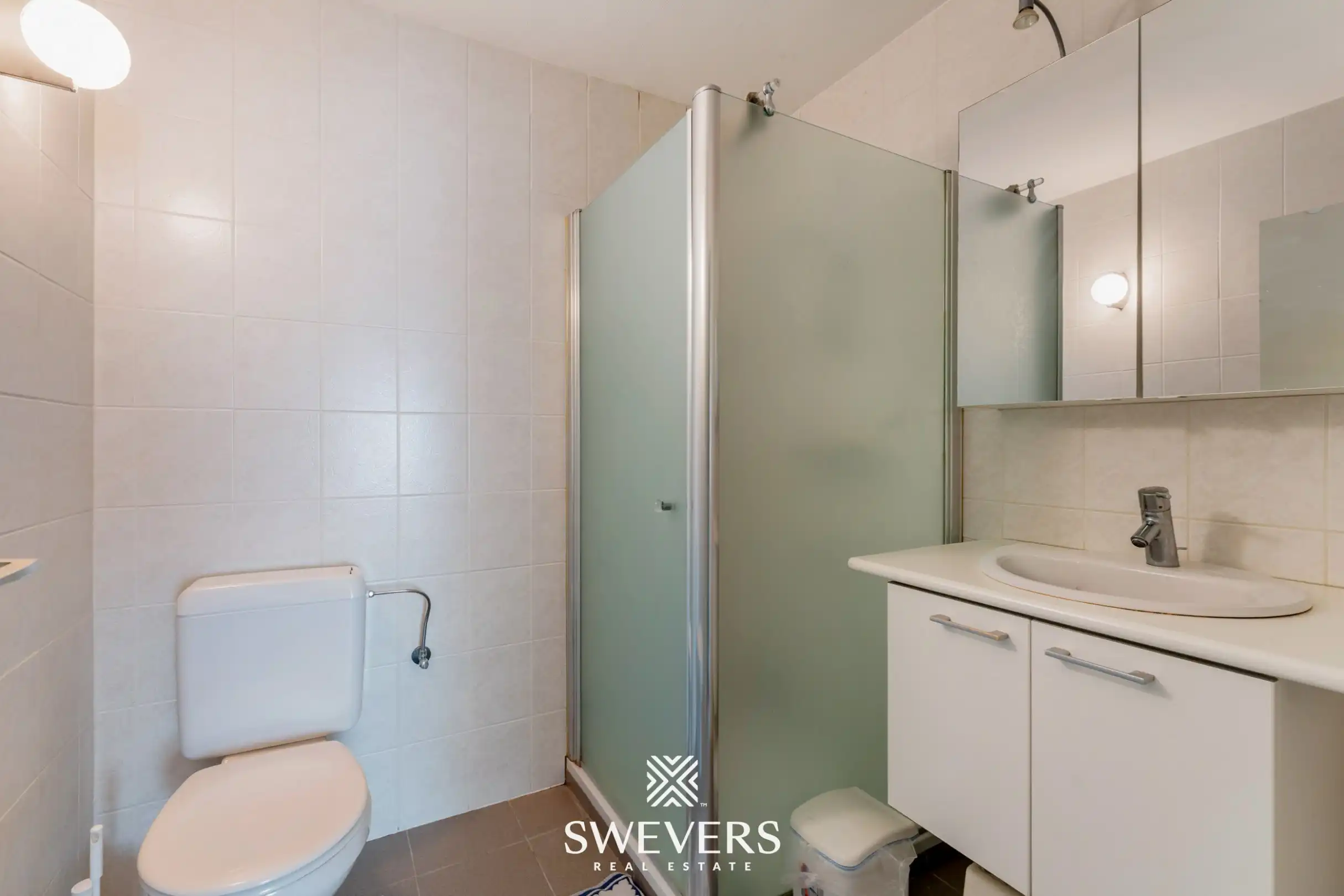 Ruim gelijkvloers 3-slaapkamerappartement inclusief autostaanplaats en kelderberging nabij Hasselt-centrum foto 17