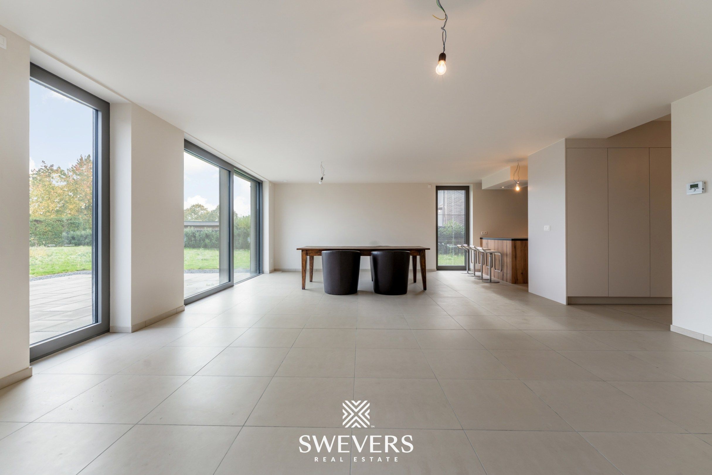 Stijlvol, gelijkvloers en instapklaar appartement (208 m²) mét private tuin en private kelder vlakbij Zolder-centrum foto 3