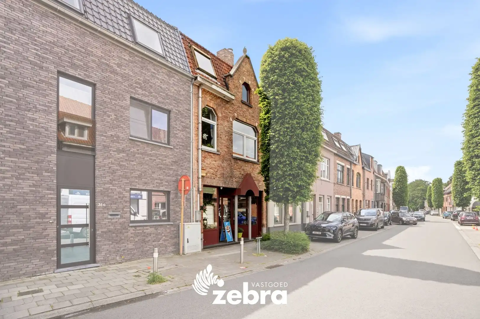 Gesloten bebouwing met 4 slaapkamers, ruime garage en handelsruimte in Sint-Kruis foto 5