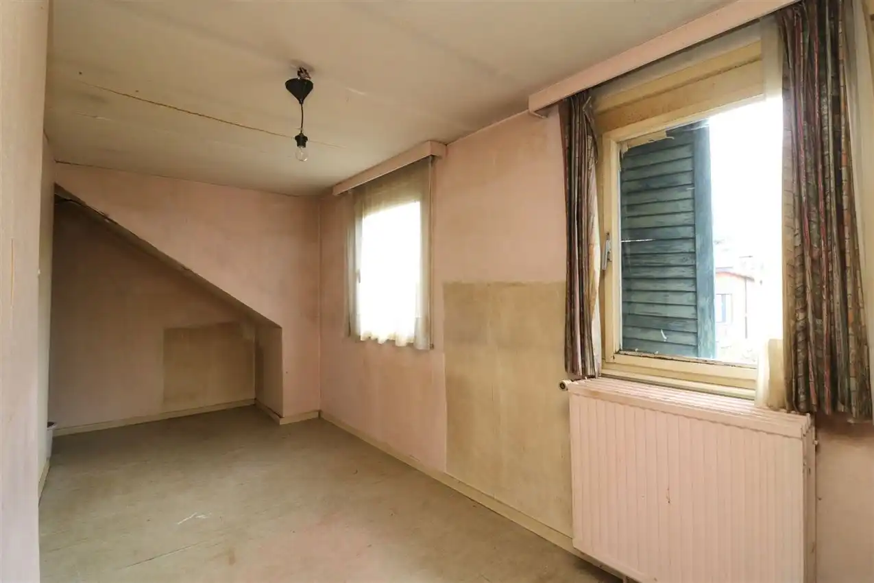 karaktervol, geliefde ligging, 6 slpk, te renoveren foto 24