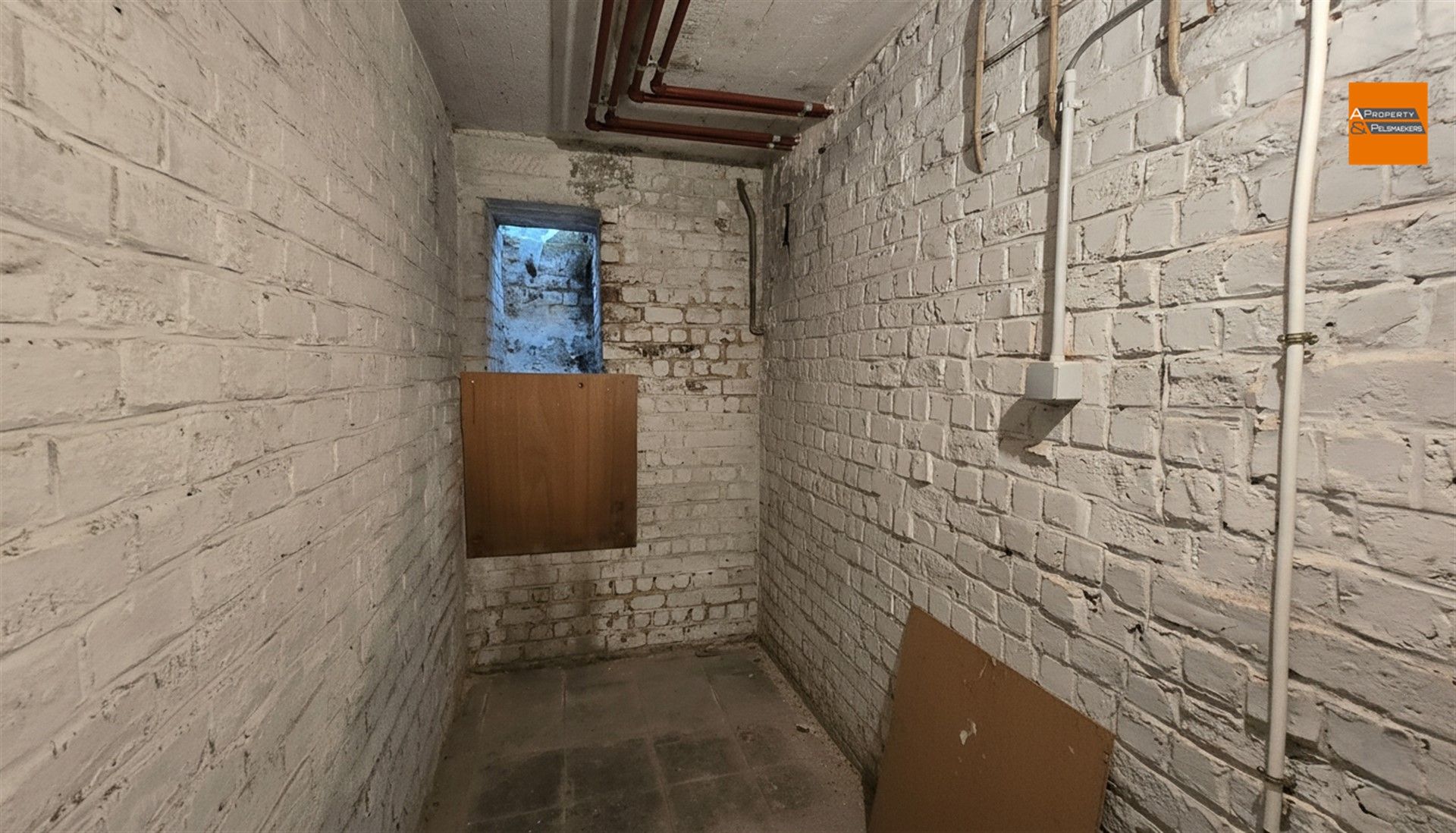 Opgefrist gelijkvloersappartement in Etterbeek foto 19