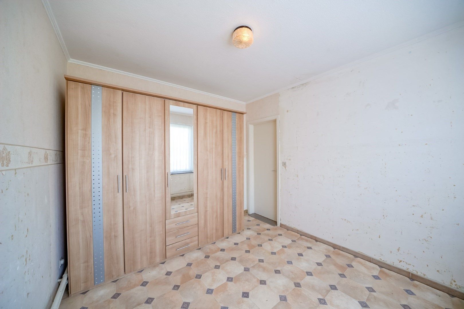 Ruime halfopen woning te koop in Oudenburg foto 14