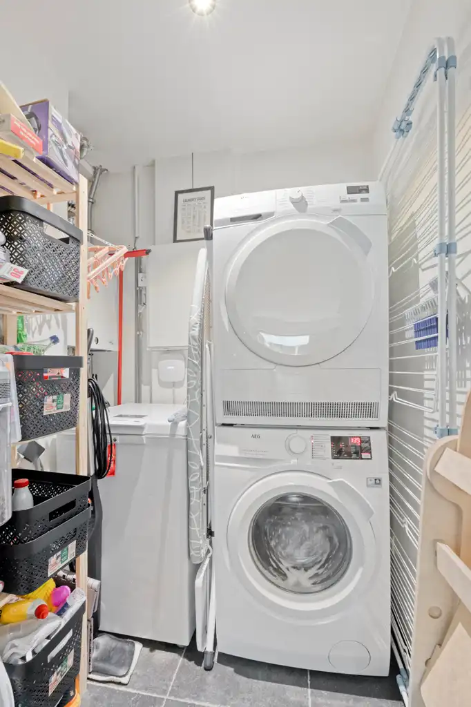 Instapklaar 2-slaapkamerappartement met tuin en garage foto 15