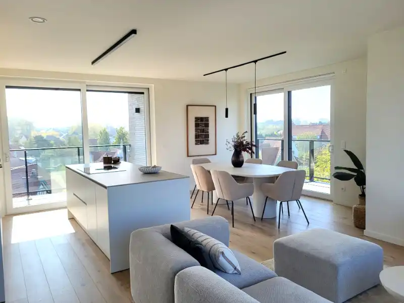 2-slaapkamer dakappartement met ruime zongerichte terrassen foto {{pictureIndex}}