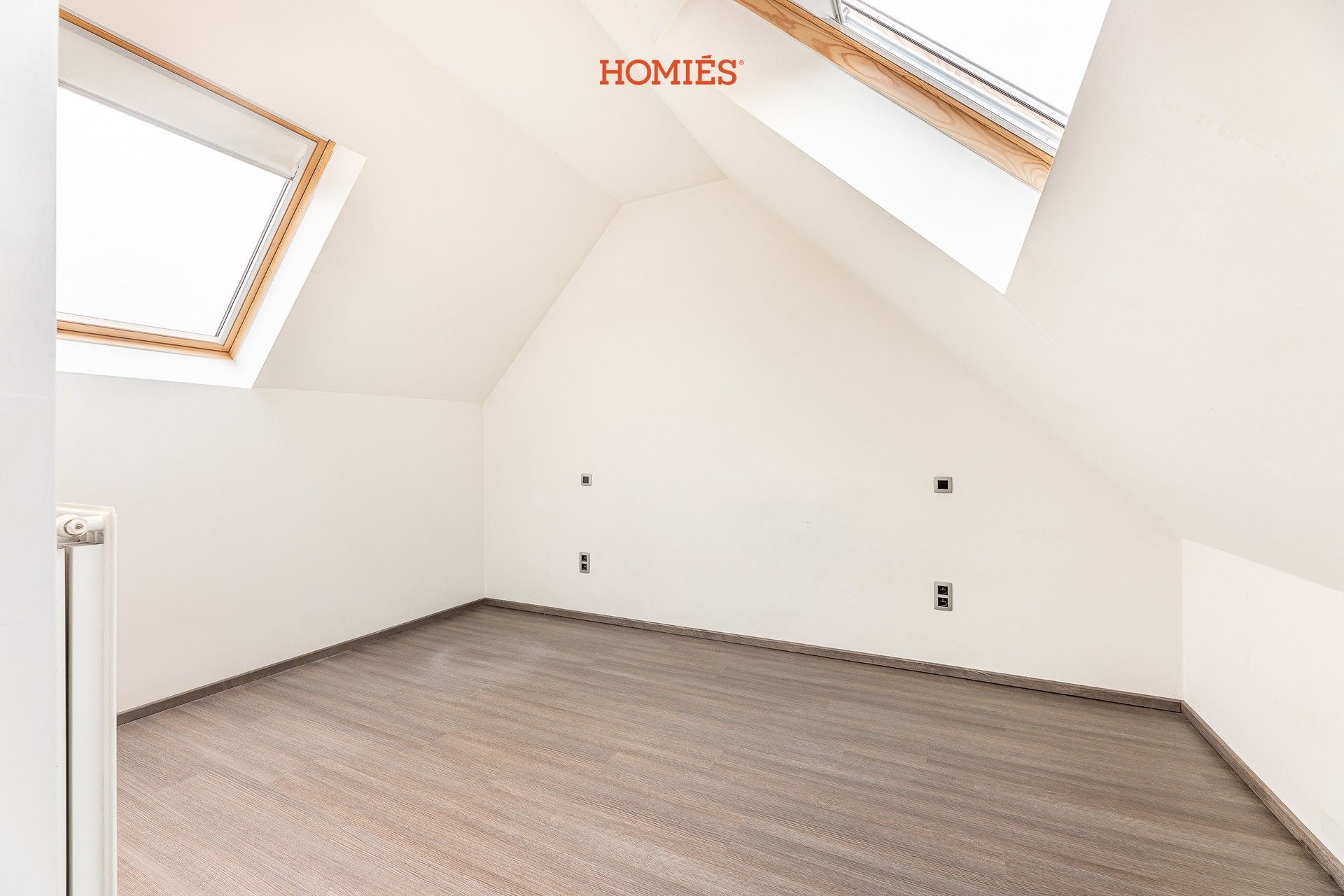 Ruim triplex appartement op strategische locatie foto 5