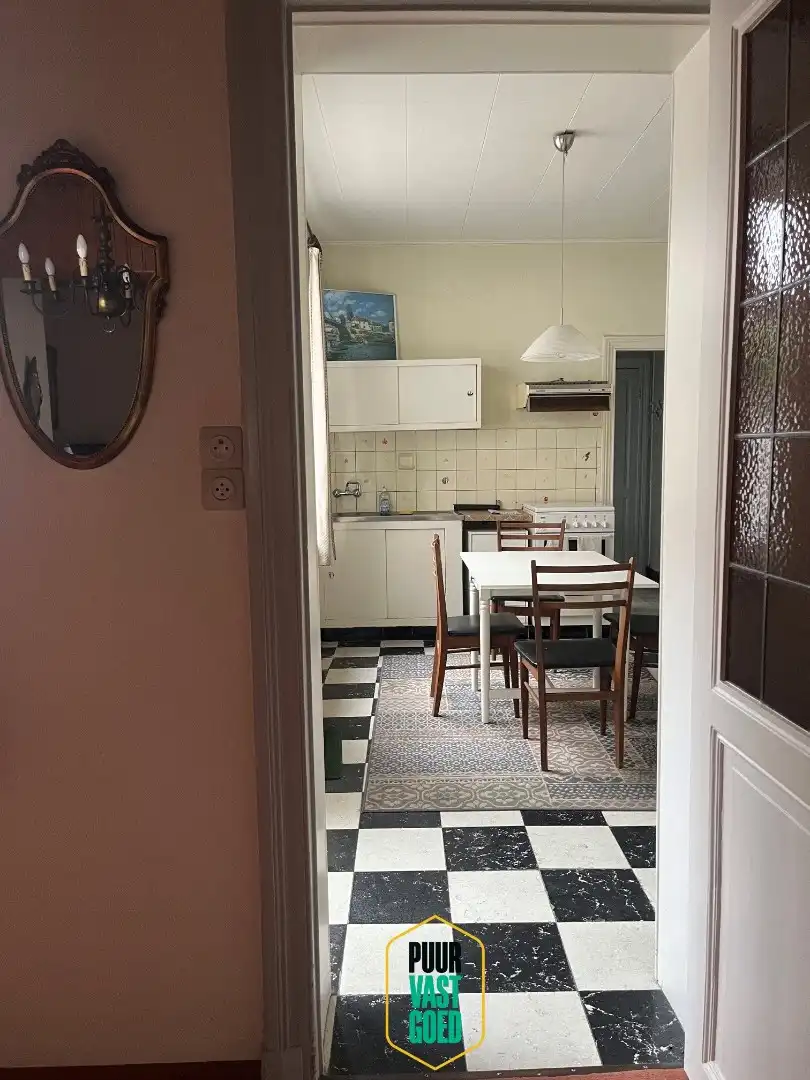 Op te knappen belle-époque woning met 'ziel' en een heel toffe tuin foto 7