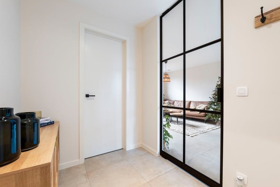 PRACHTIG NIEUWBOUWAPPARTEMENT MET 2 SLKS EN EEN STAANPLAATS IN HET LANDELIJKE HEERS foto 3