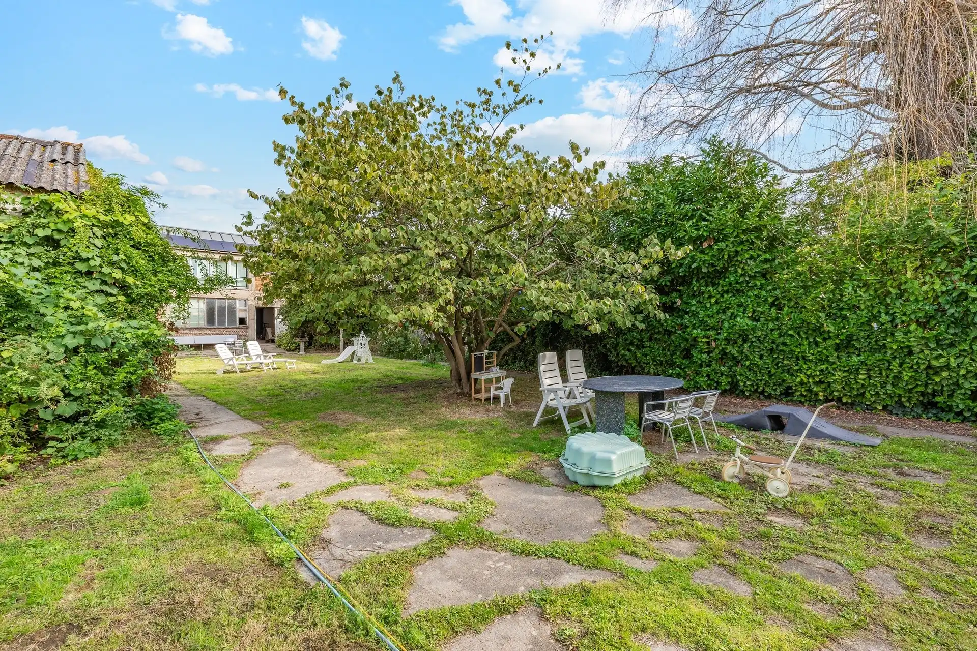 Karaktervol herenhuis met art-decoallure, ruime magazijnen en zuidgerichte tuin  foto 32