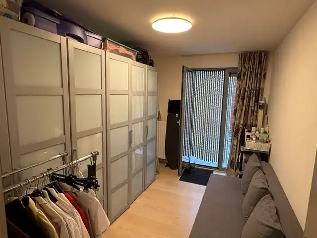 Ruim en toegankelijk 2-slaapkamerappartement met terras in Waregem foto 15