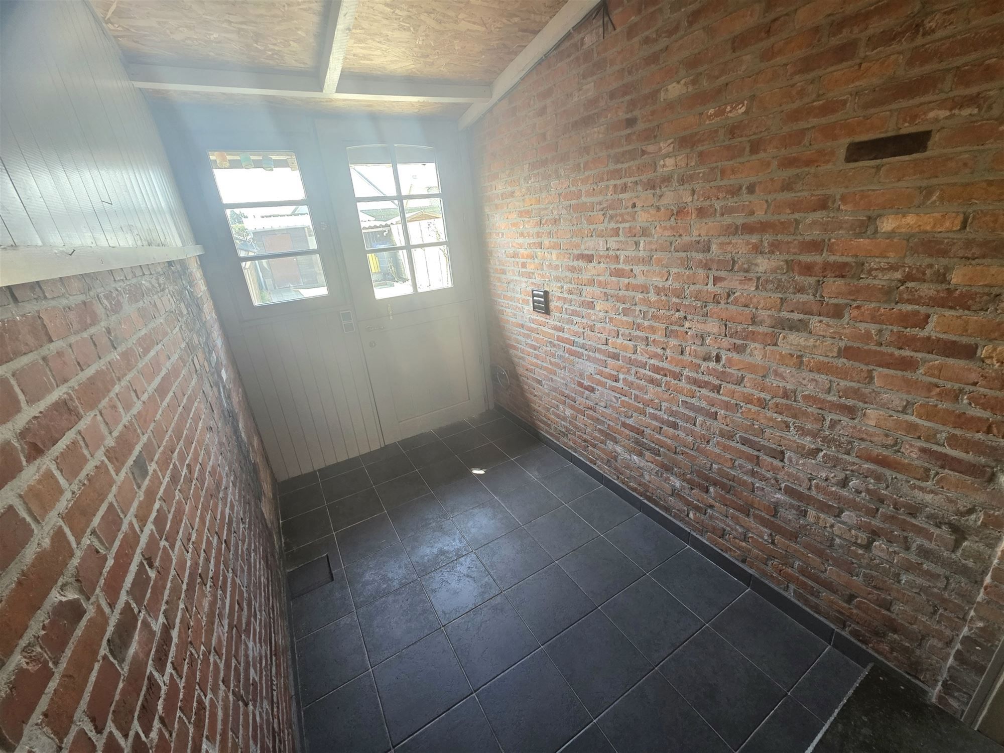Burgerswoning met 2 à 3 slpks, parking en tuin met ingang foto 7