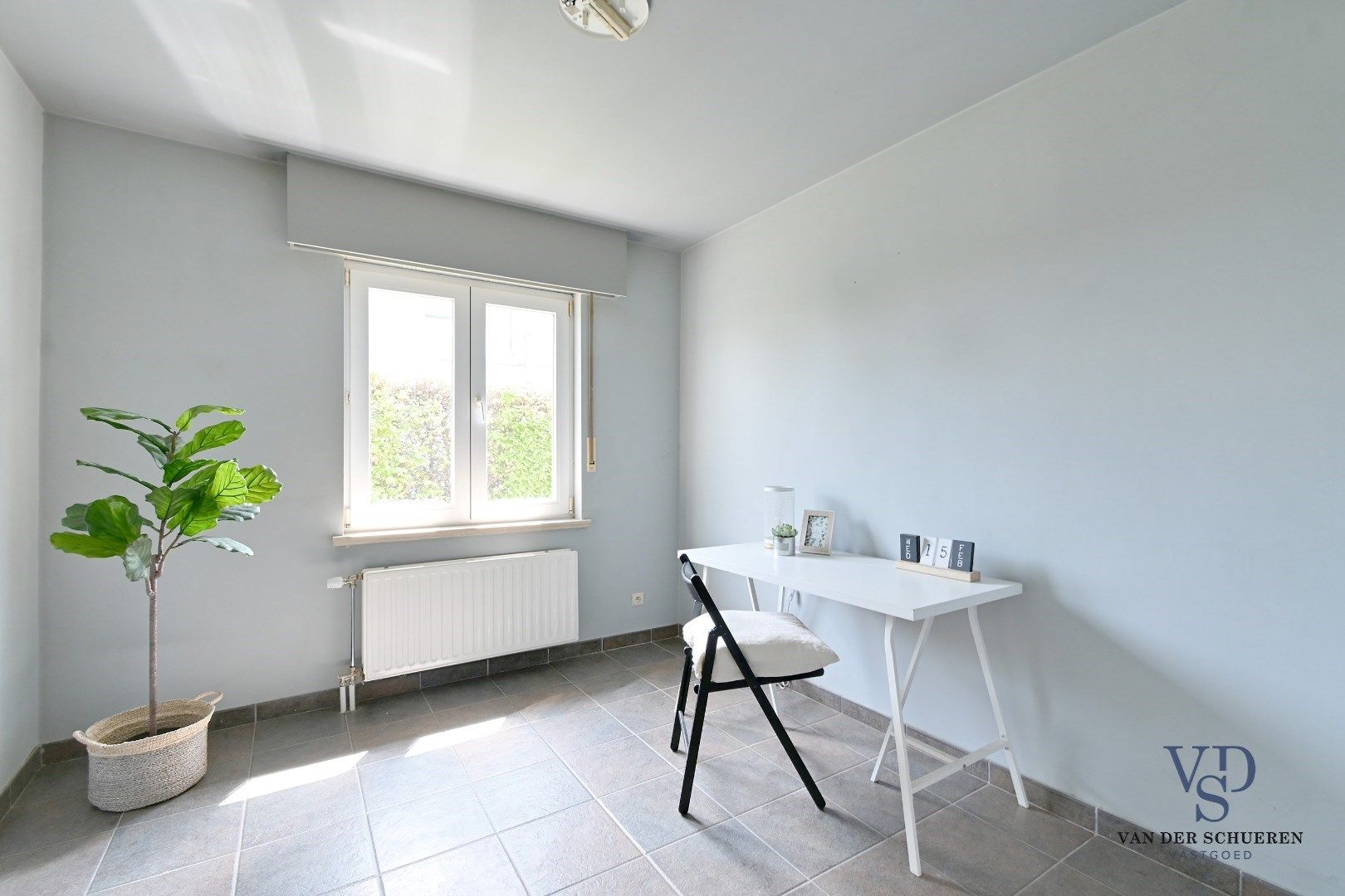 Bungalowwoning met afzonderlijke garage foto 8