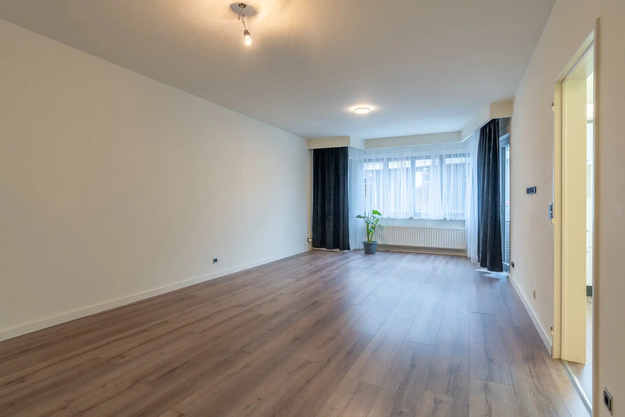 Centraal gelegen 2 slpk app met autostaanplaats te Turnhout foto 2