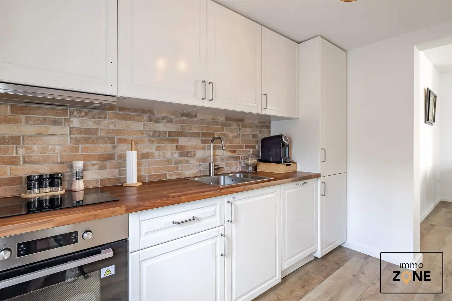 Karaktervolle handelswoning met ruim appartement in Hamme! foto 4