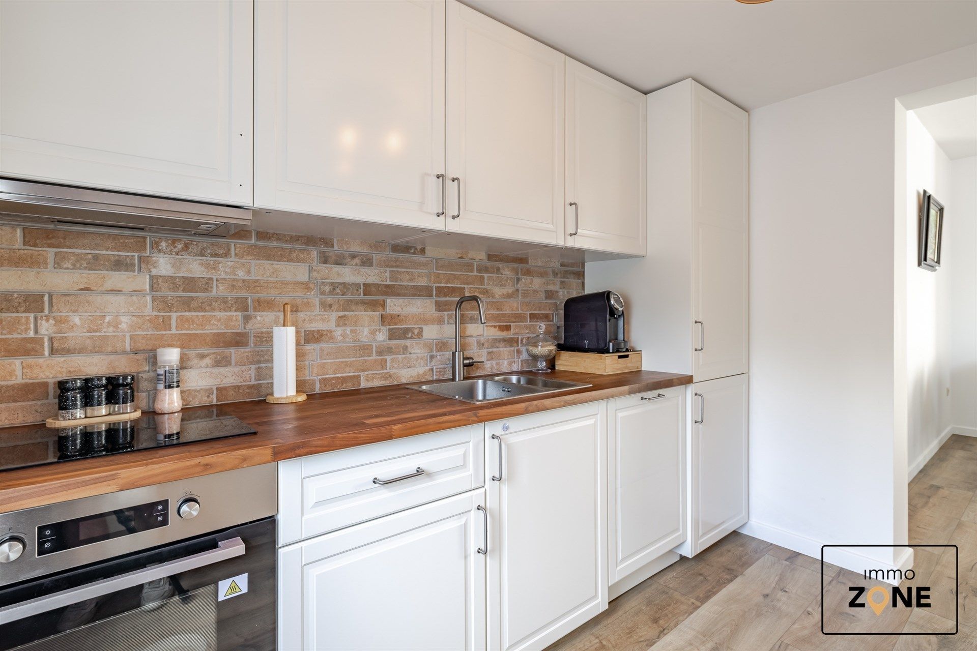 Karaktervolle handelswoning met ruim appartement in Hamme! foto 4