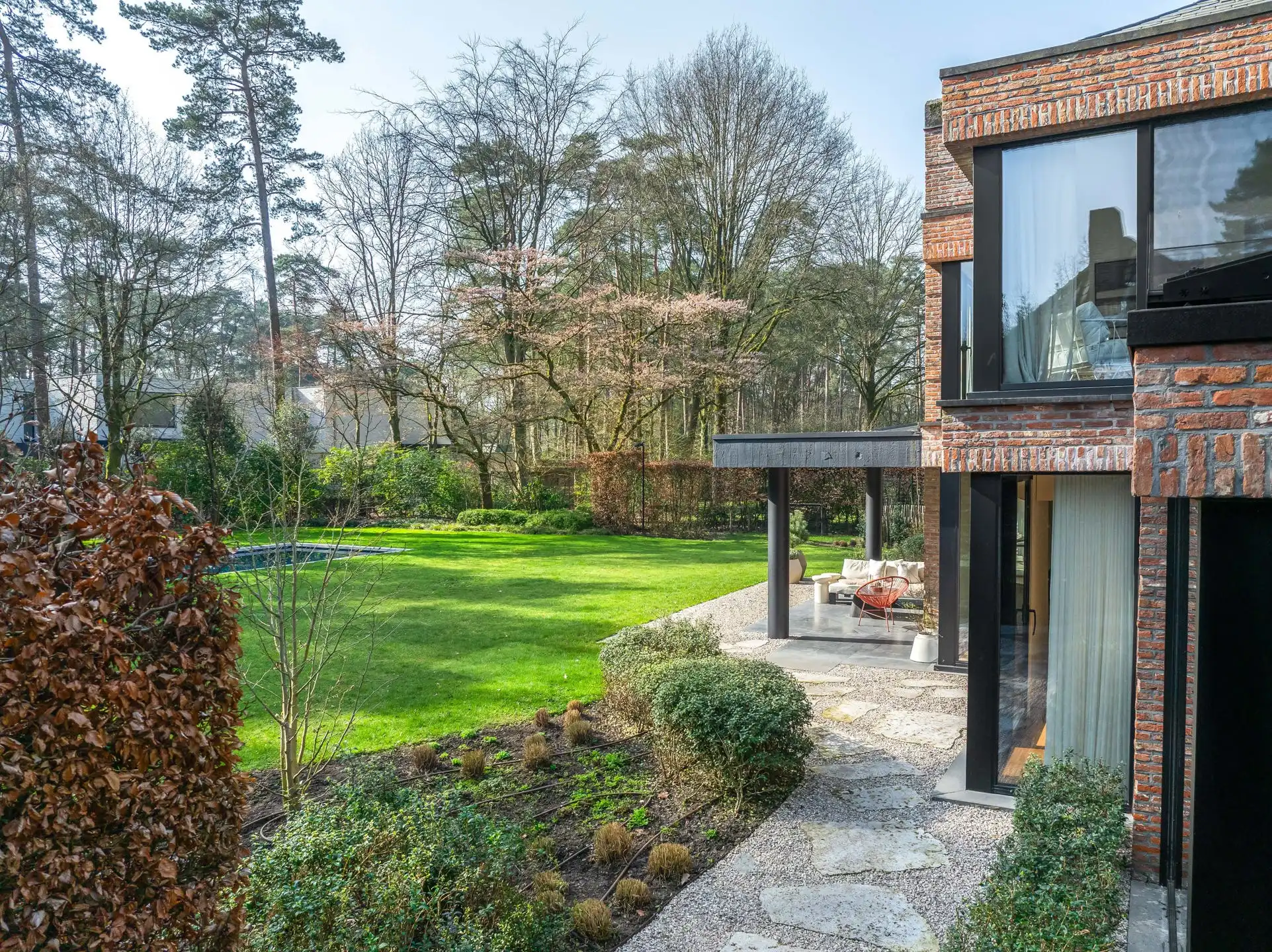 Architectenvilla met zwembad en ZW tuin in Hof Ter Linden foto 21