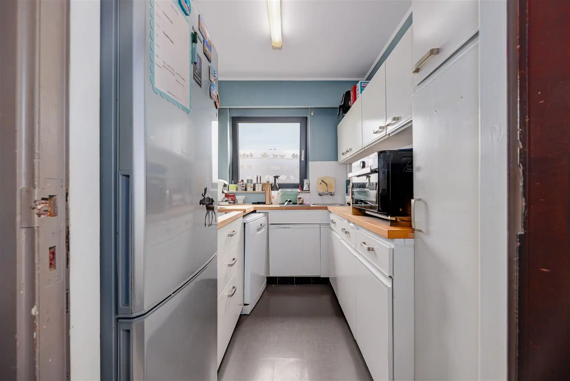 Vergund betonnen opbrengsteigendom met 3 appartementen + garagebox foto 18