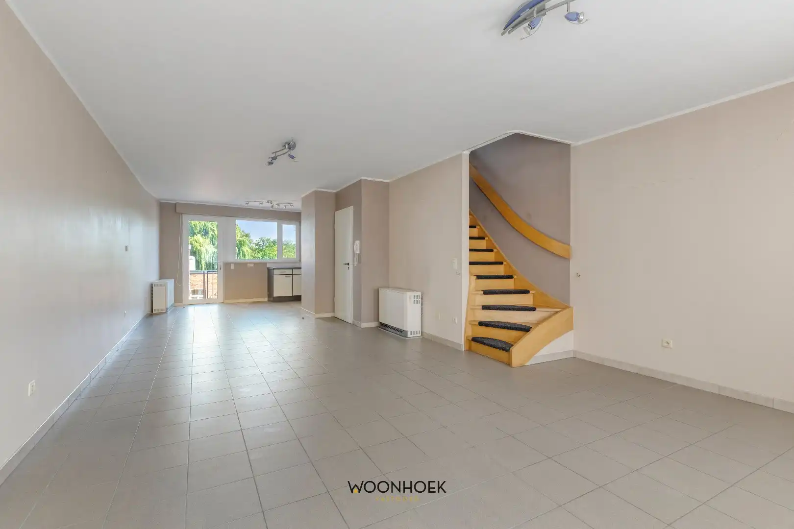 Energiezuinige woning met 4 slaapkamers en grote tuin! foto 4