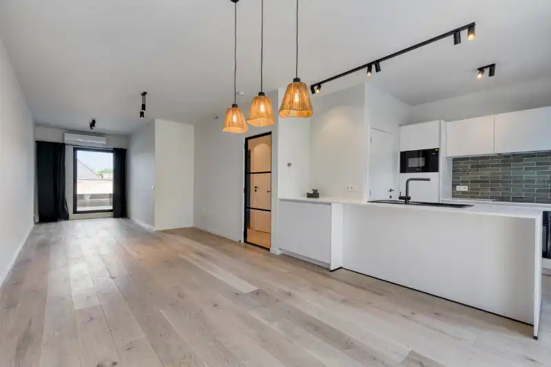 Te huur – stijlvol en energiezuinig appartement in Zeveneken foto 3