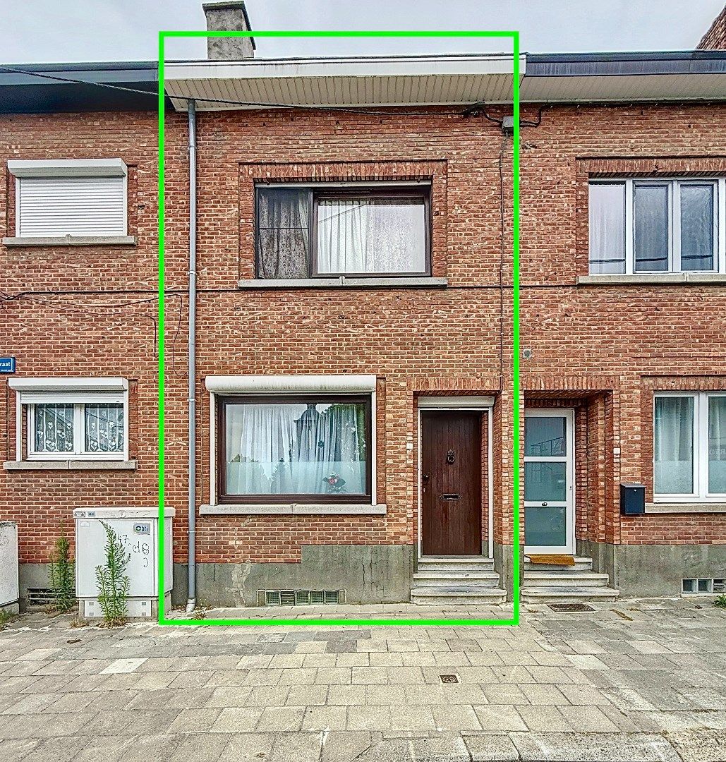 Gezellige woning te koop in het hart van Wilsele Dorp! foto {{pictureIndex}}