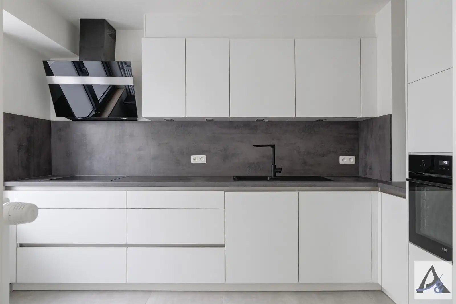 Instapklaar gelijkvloers appartement in hartje Bilzen met garage foto 12