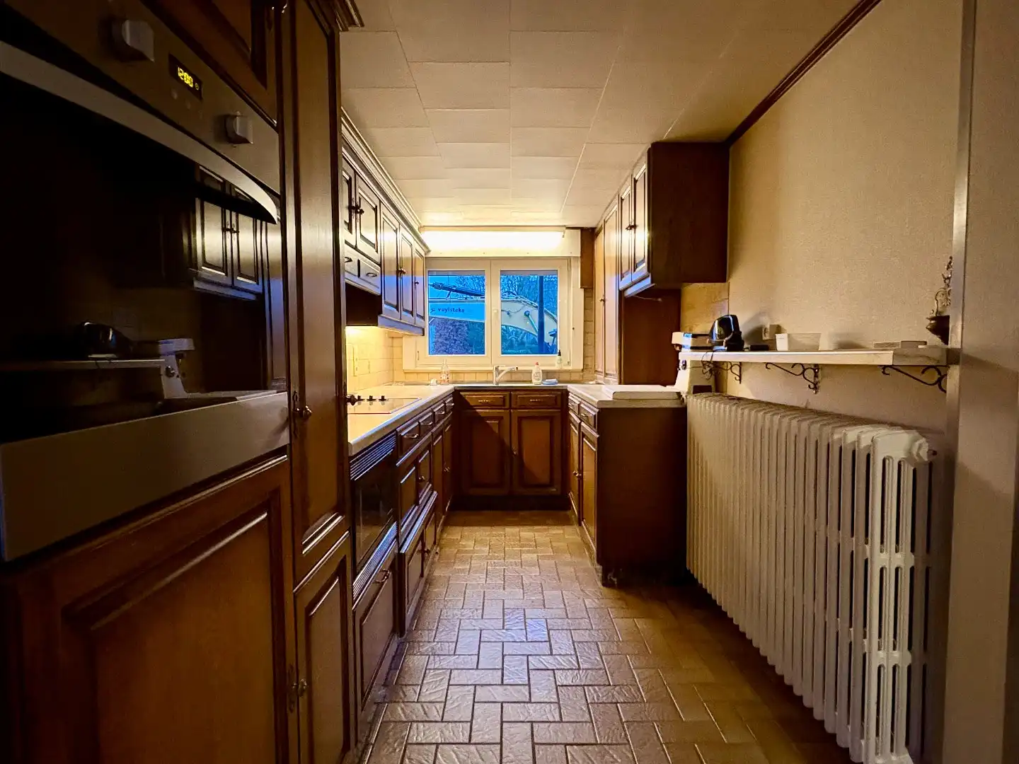 Alleenstaande woning te koop in Kuurne met ruime tuin, 3 slaapkamers en een topligging.  foto 7