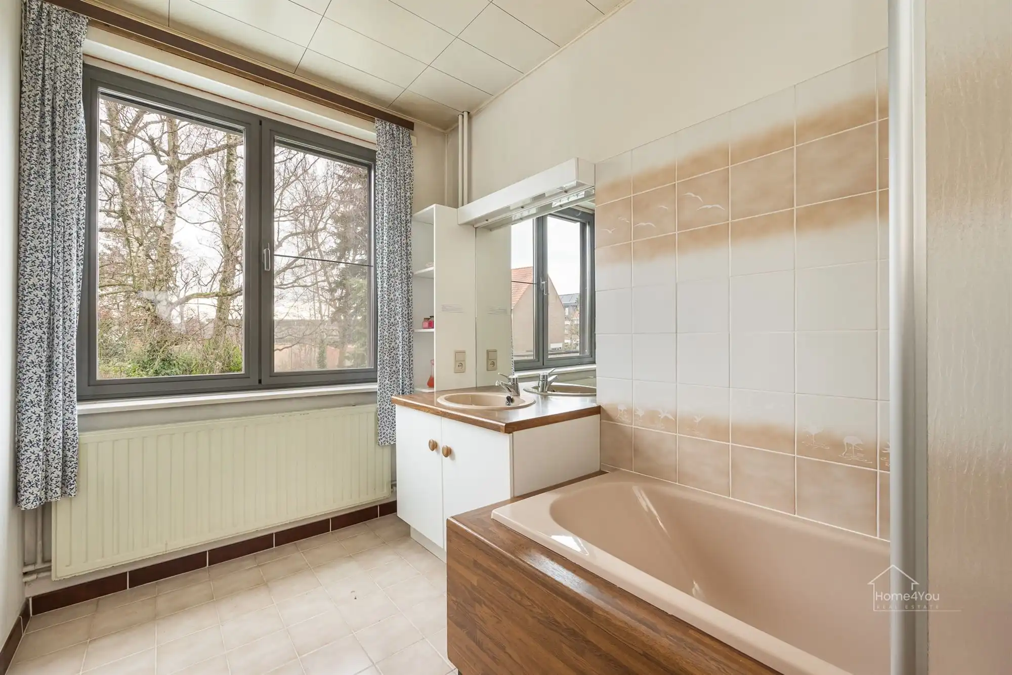 Ruime rijwoning op toplocatie met zongerichte tuin foto 12