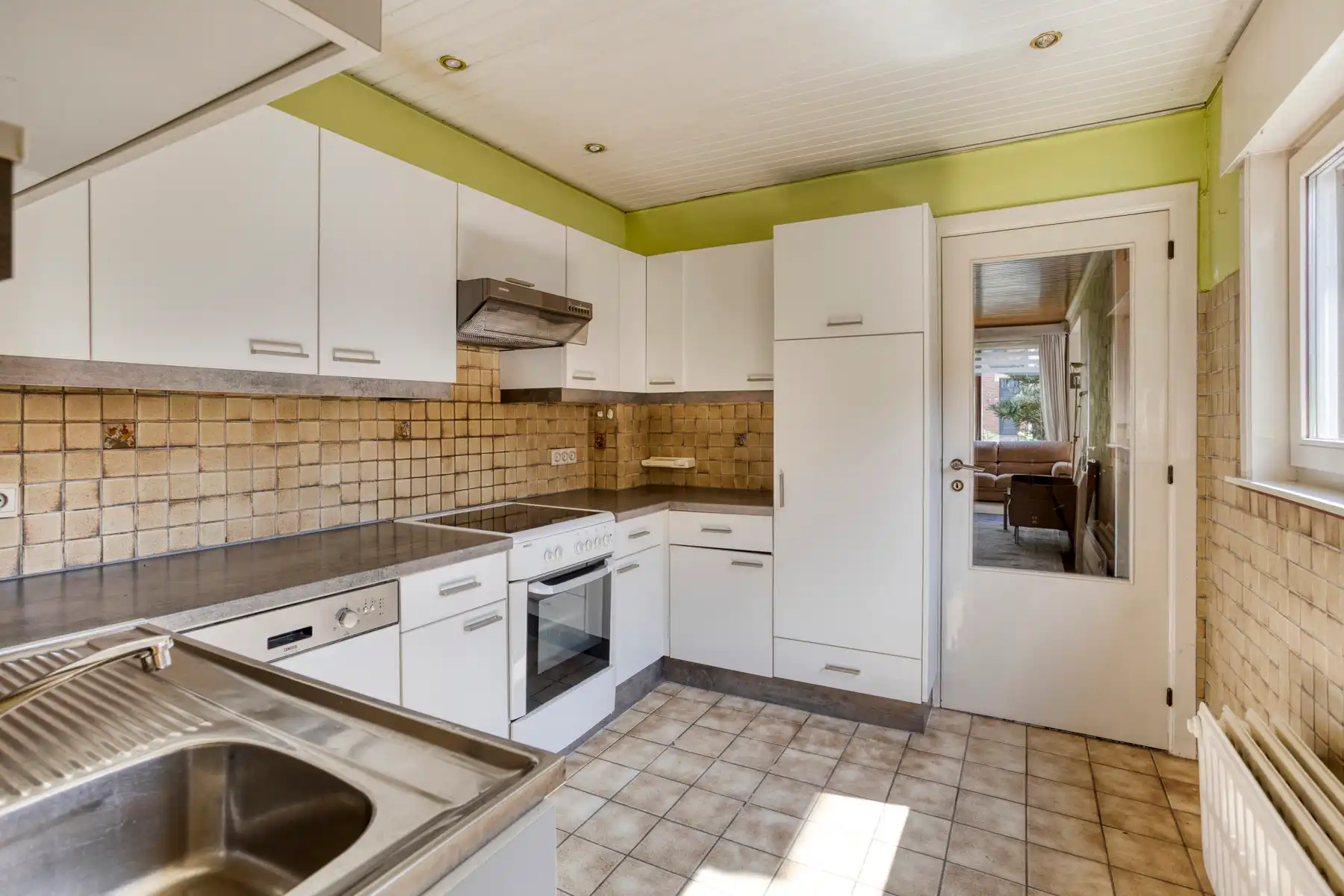 Ruime gezinswoning met potentiële bouwgrond te Mariaburg. foto 11