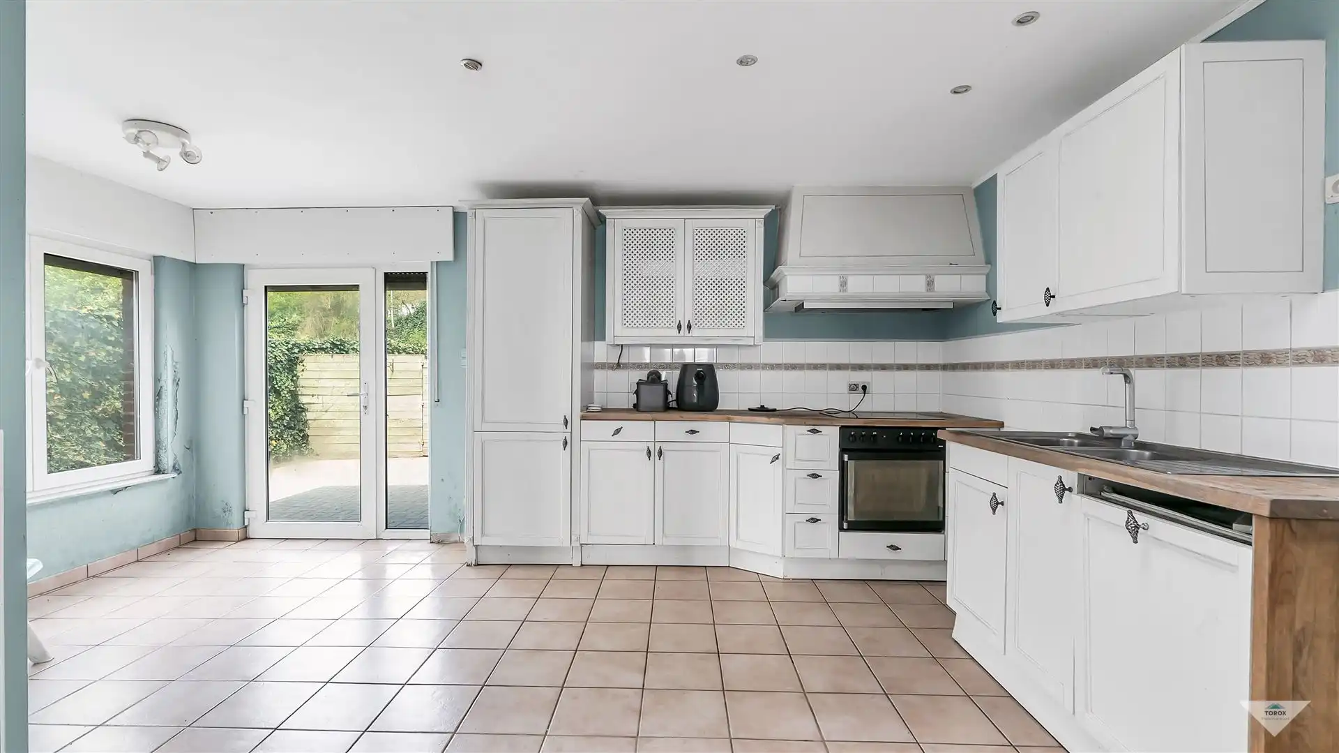 Te renoveren woning met veel potentieel in Korbeek-Dijle foto 4