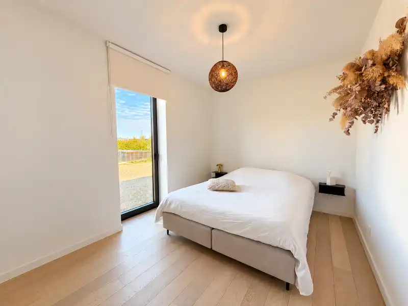 Luxueus designappartement met zuidterras, carport en ruime kelder foto 8