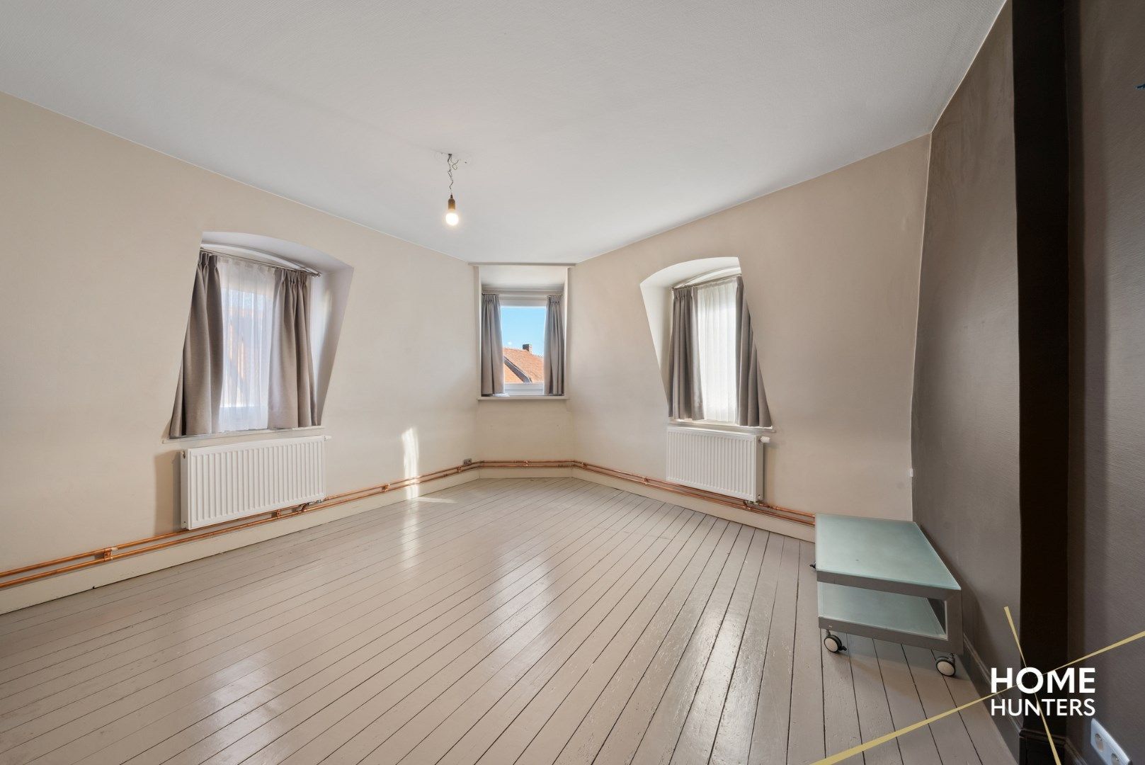 Gezellig duplexappartement met 3 slaapkamers en een zonnig terras te Ieper foto 15