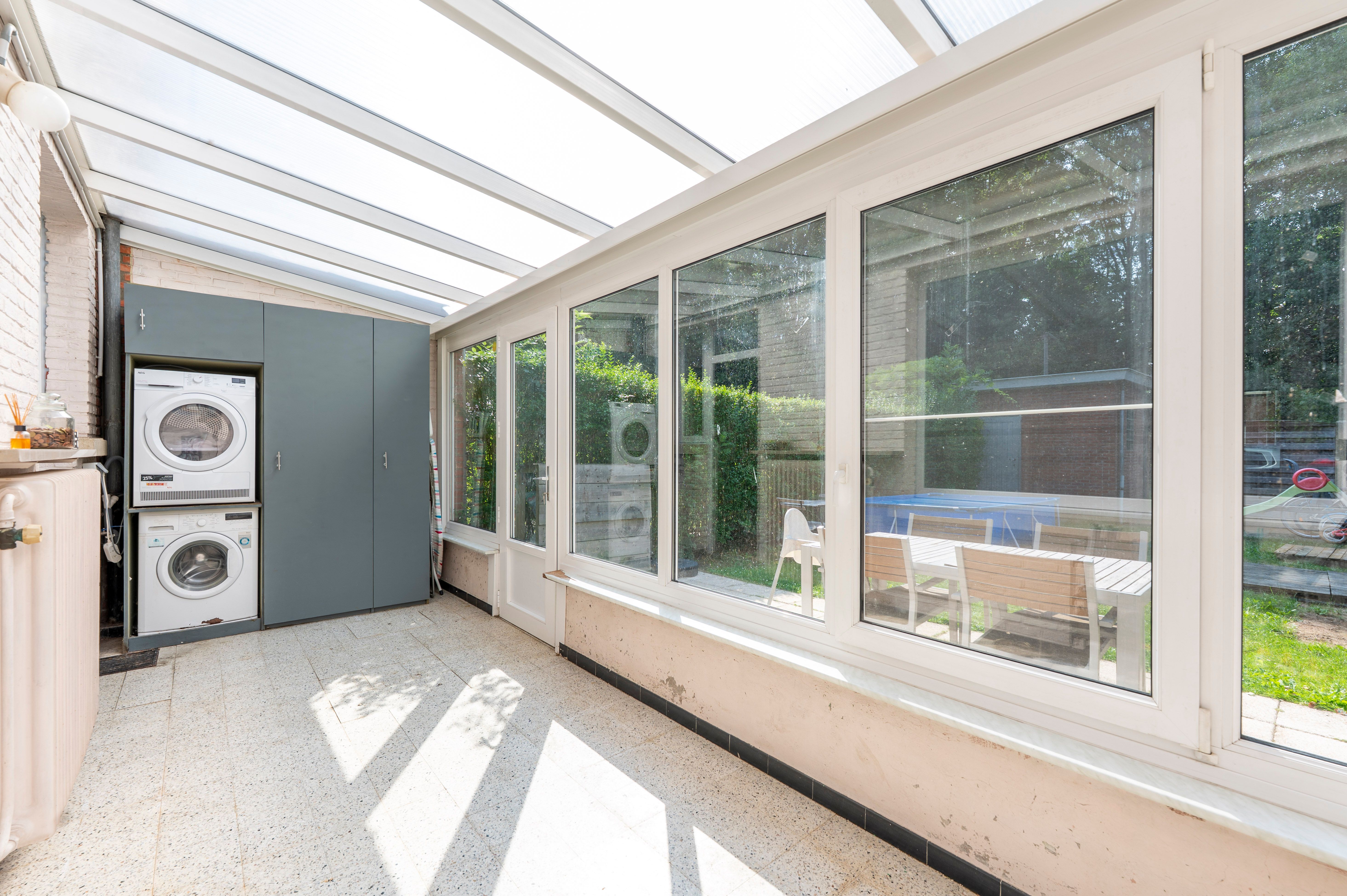 Instapklare gezinswoning met tuin en achteringang op centrale locatie in Ekeren! foto 11