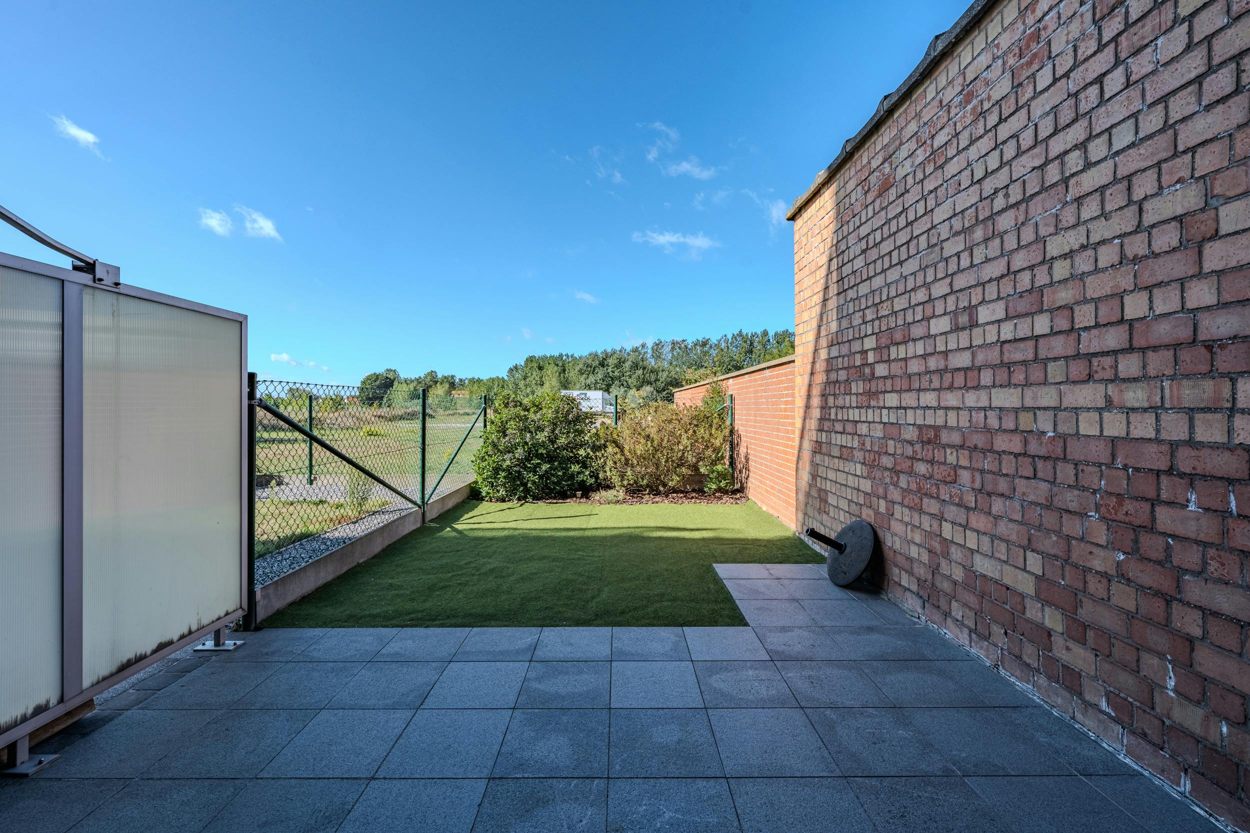 Instapklaar gelijkvloersappartement met zongerichte tuin! foto 11