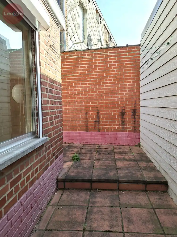 Goed gelegen woning // 2 slaapkamers + zolder om af te werken foto 16