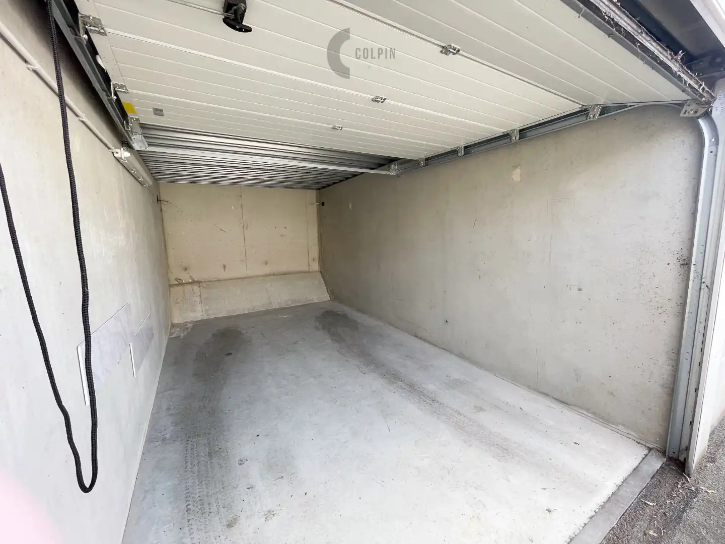 Afgesloten garagebox in garagecomplex op centrale ligging in Heist centrum foto 6