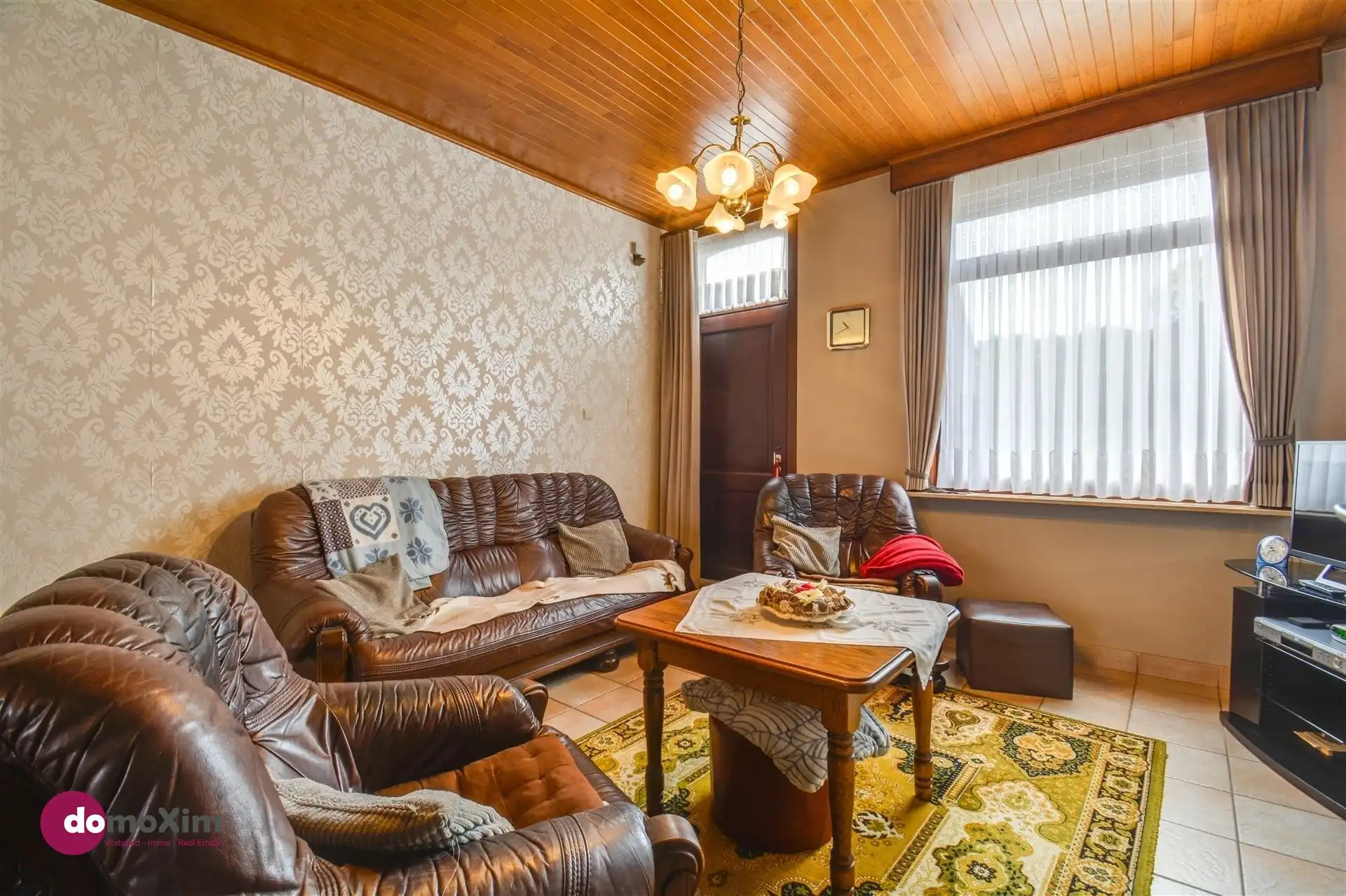 Gezinswoning met 3 slaapkamers en veel potentieel nabij het centrum van Boortmeerbeek foto 4