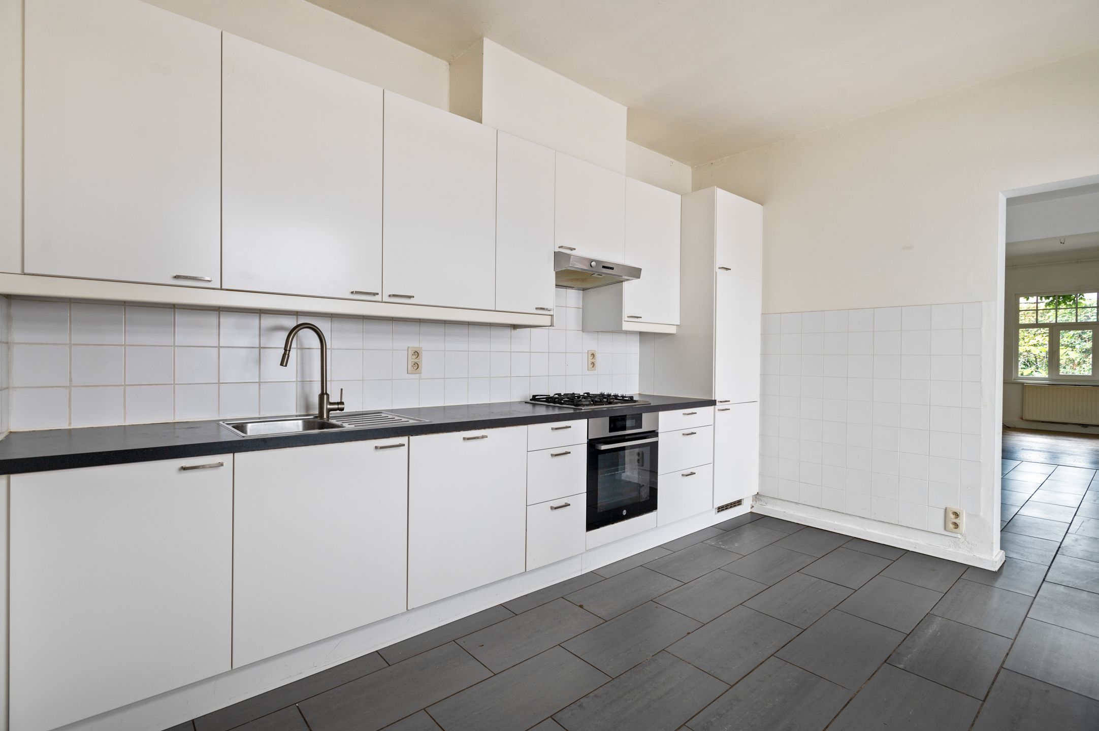 Halfopen woning met 2 slaapkamers en een grote tuin in Brasschaat te huur! foto 9
