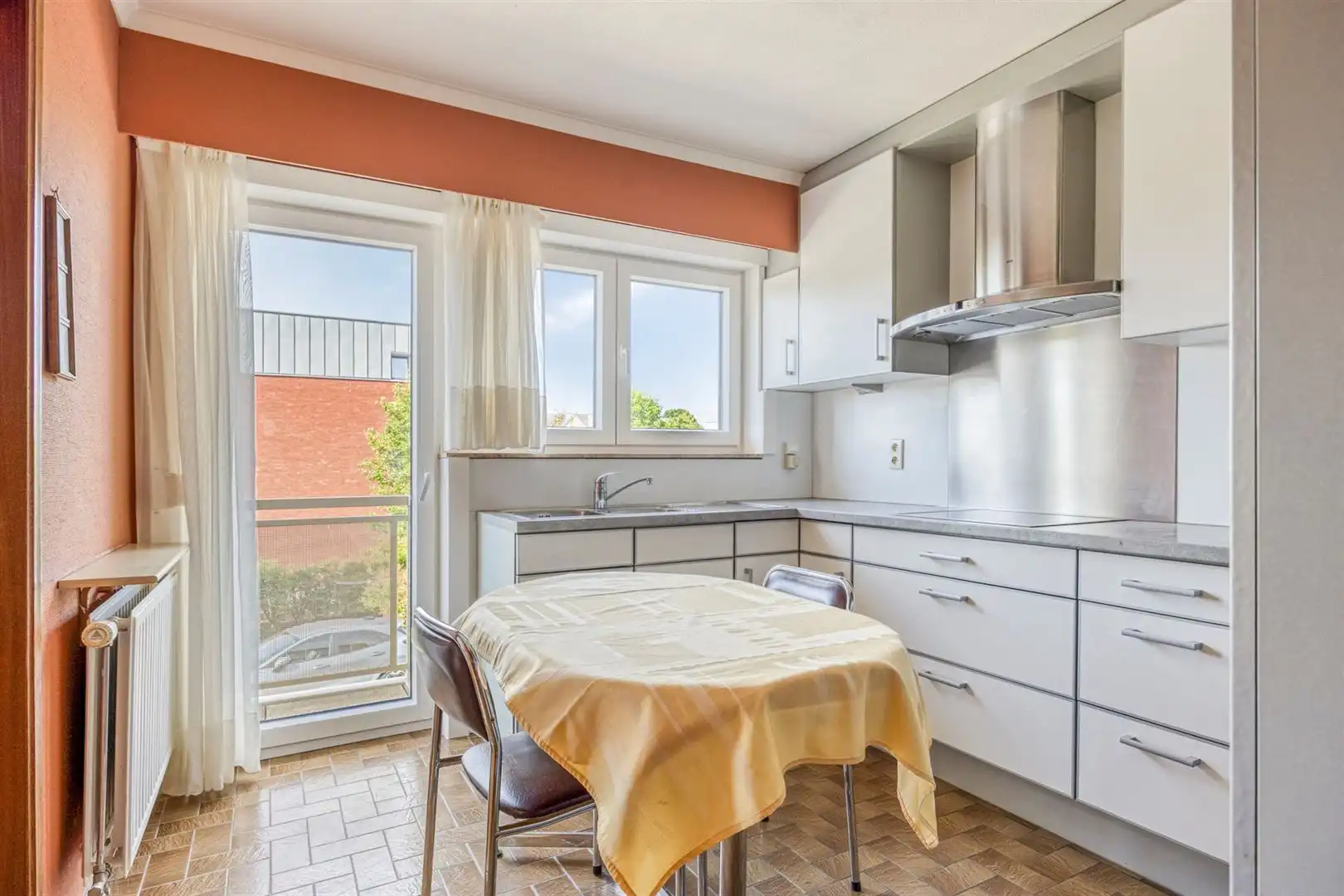 TE KOOP: Verzorgd appartement met 2 slaapkamers en ondergrondse staanplaats in hartje Heusden! foto 9