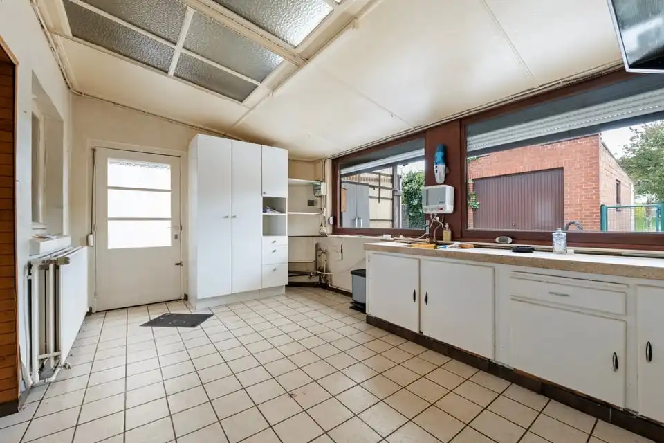 TE RENOVEREN GEZINSWONING MET GARAGE IN HET CENTRUM VAN GINGELOM foto 13