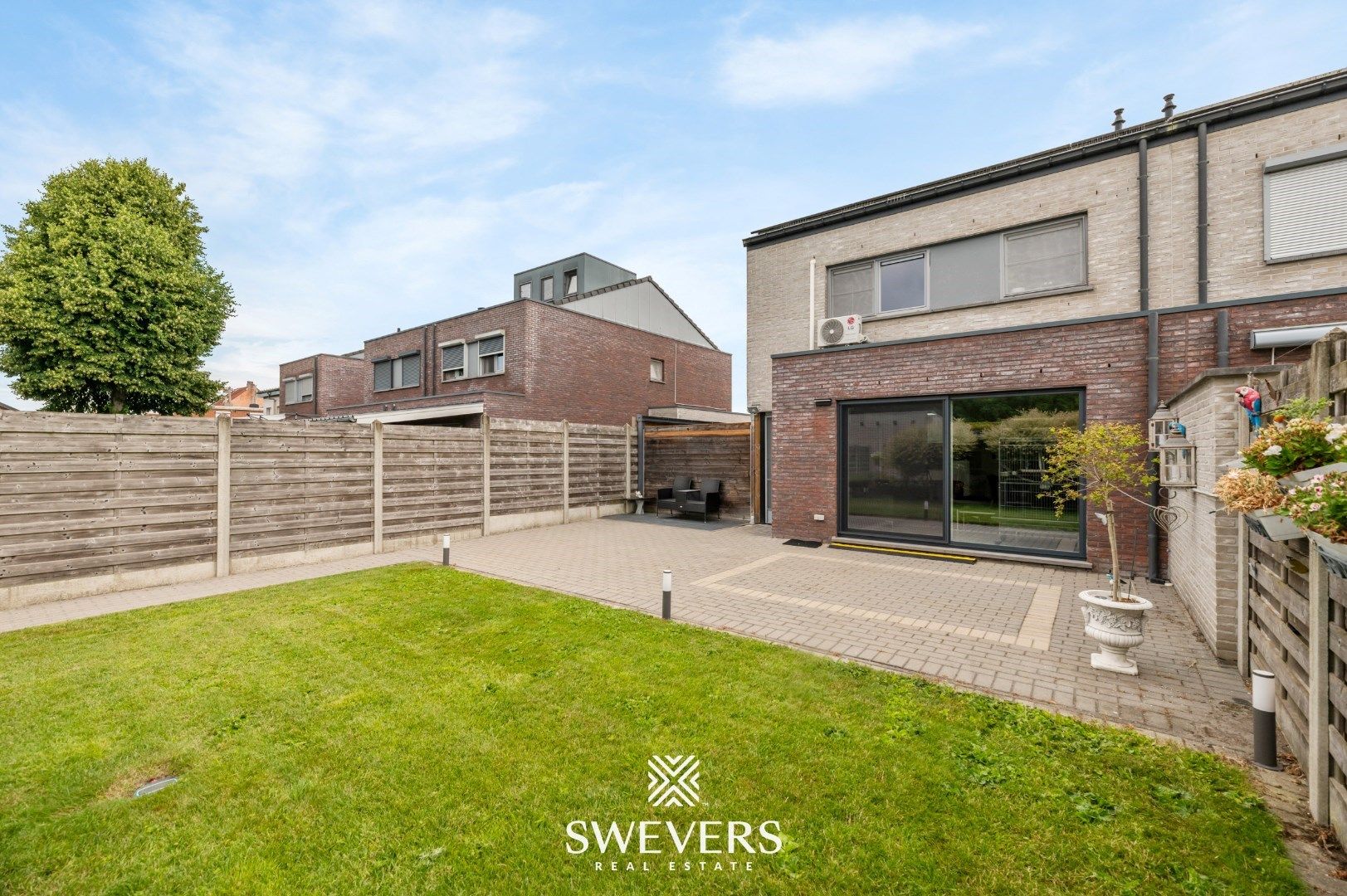 Instapklare halfopen woning met vernieuwde keuken, tuin en garage in Leopoldsburg foto 24