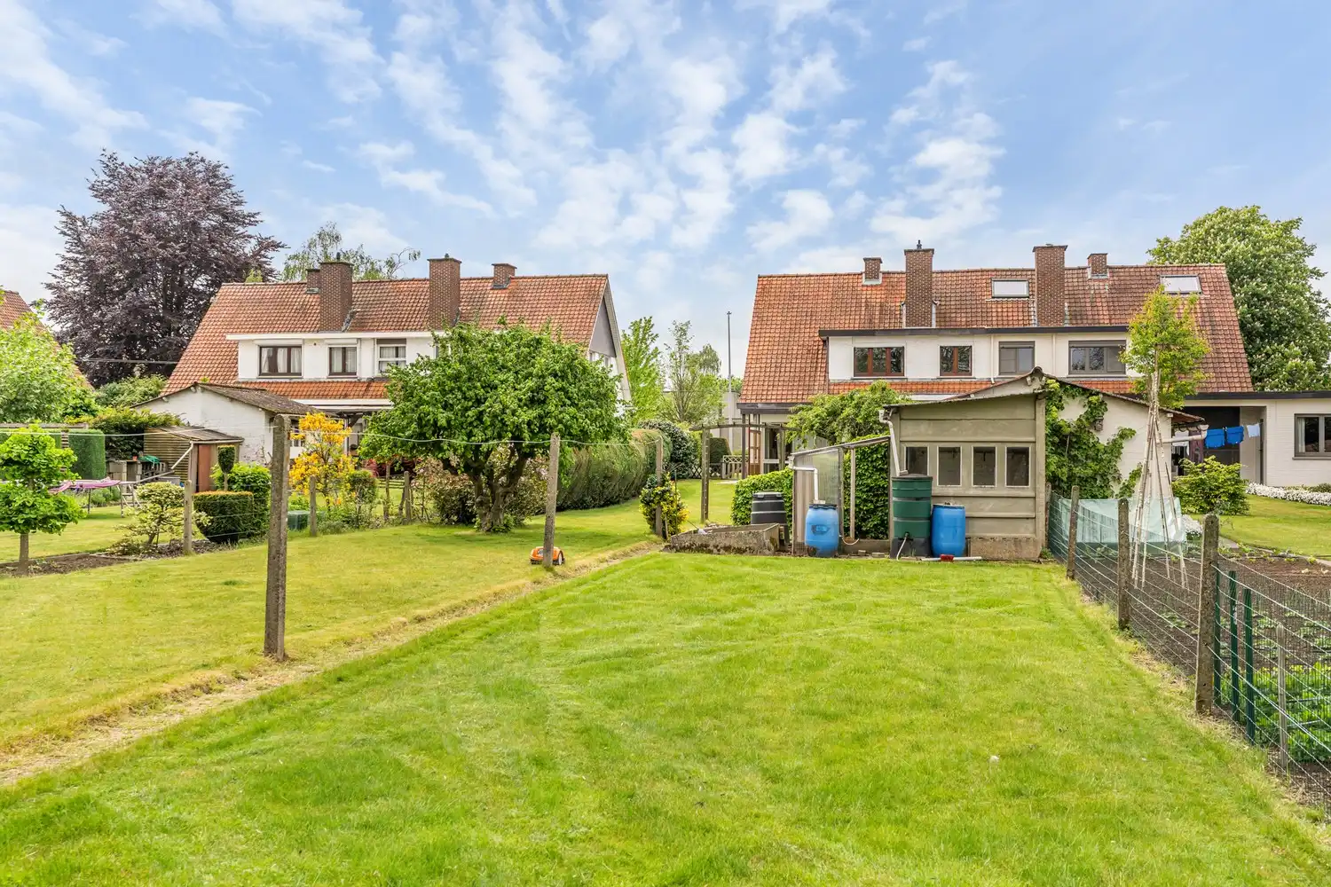 Goed gelegen woning met 4 slaapkamers, een garage en een diepe tuin in een verkeersluwe straat te Kessel-Lo! foto 25