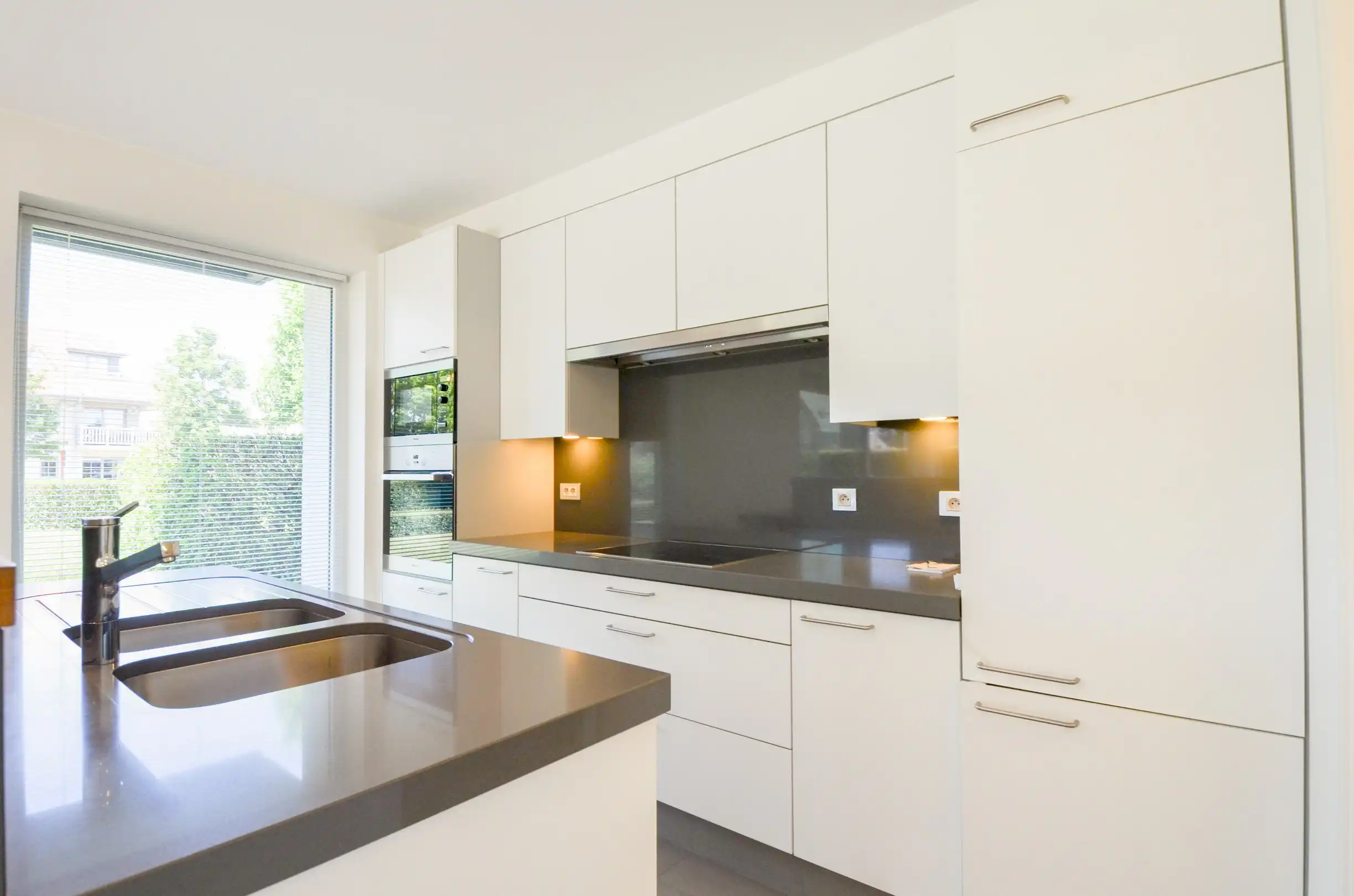 Interessante opbrengsteigendom: verhuurd appartement met tuin en garage in centrum Oostduinkerke foto 7