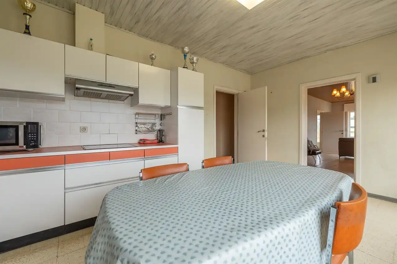 Gelijkvloerse woonst, 3 slpk, op 29a 53ca foto 7