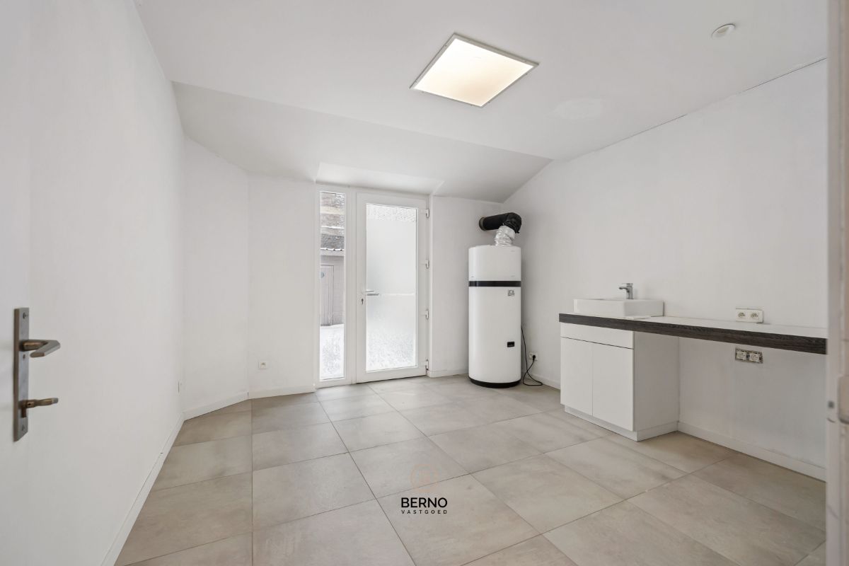 Gerenoveerde handelswoning met tuin foto 16