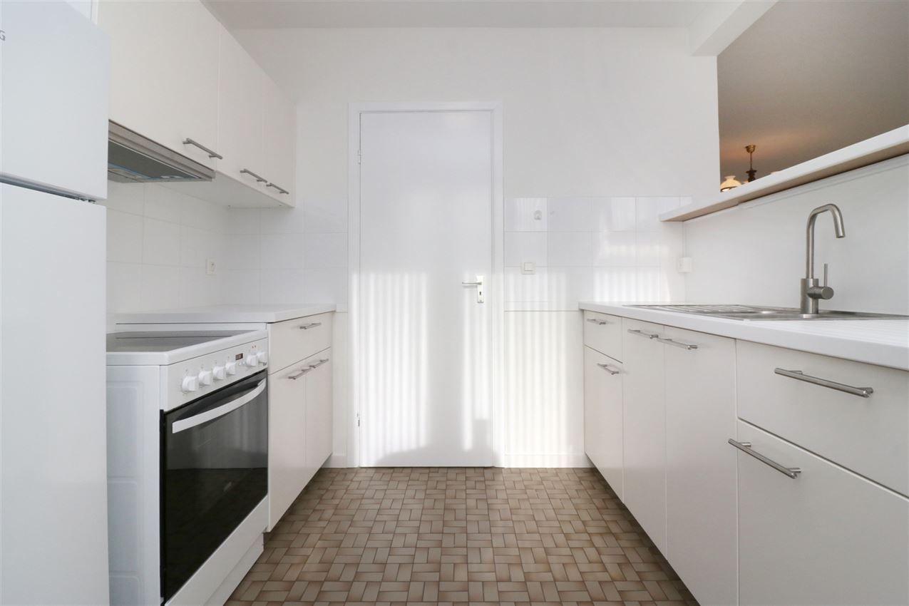 Centraal gelegen app met 2 slpk.en garagebox foto 9