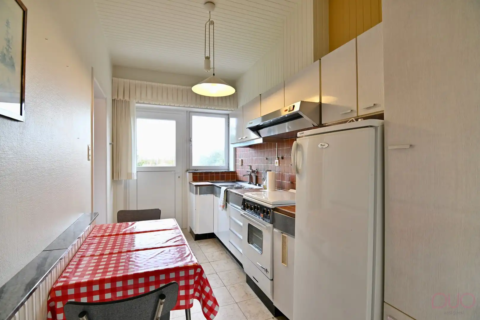 Ruime licht op te frissen woning nabij het centrum van Tienen met 3 slaapkamers op een perceel van 6a 40ca foto 9