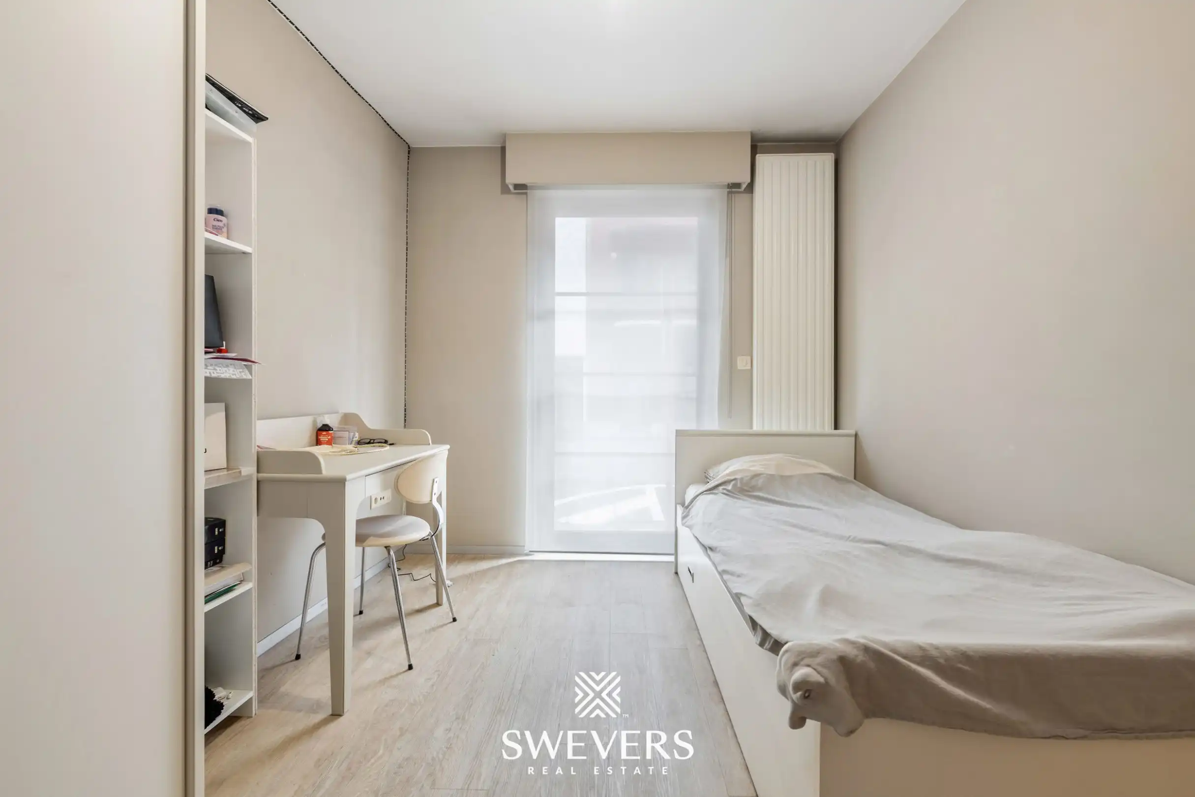 Uitstekend gelegen appartement met 2 slaapkamers, private tuin en ondergrondse staanplaats foto 7