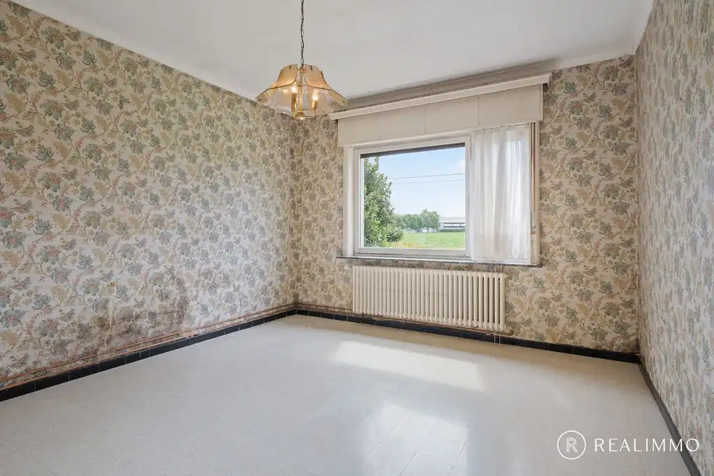 Te renoveren alleenstaande woning met tal van troeven! foto 6